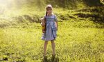 Little girl on the lawn on a sunny day free image download