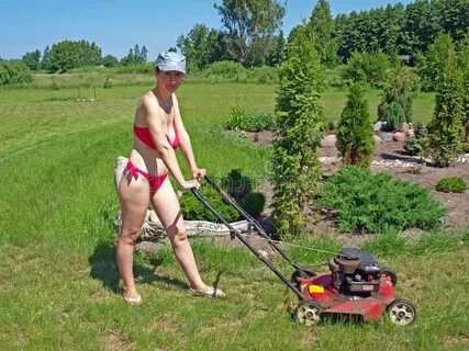 Woman Mowing Grass 2 Photos - Free & Royalty-Free Stock Phot