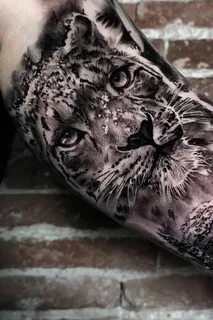 Black and Grey Snow Leopard Sleeve Tattoo - Realistic big ca