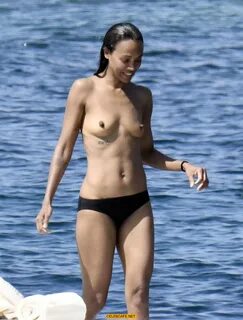 Zoe Saldana topless on a yacht in Italy