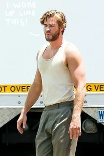 Liam Hemsworth Shows Off His Muscular Arms On The Set Of The