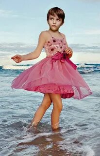 I like playing in the water while dressed up like a little girl.