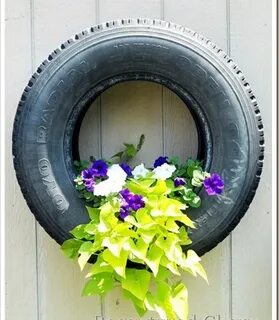 Reusing an old tire to make a planter Tire planters, Old tir