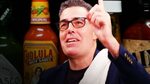 Watch Adam Carolla Take on the Hot Ones Challenge First We F