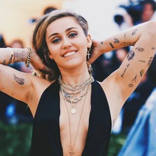 Miley cyrus boob tattoo