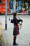 Girl in a scottish skirt with bagpipes free image download
