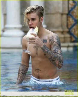 Justin Bieber Goes Shirtless for a Swim at the Versace Mansi