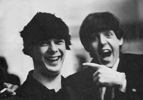 Brian Epstein( wearing Beatles wig) and Paul McCartney . Tak