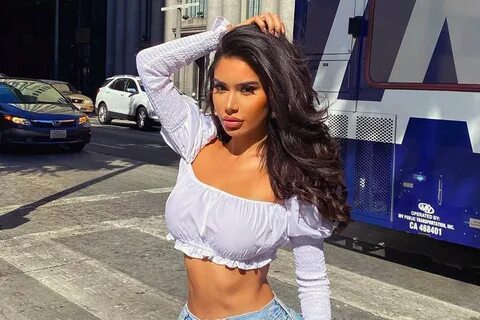 Janet Guzman Parades Her Hourglass Figure While Posing Up In