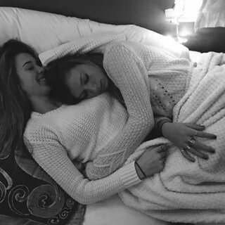Two lesbian couple cuddling in bed photography " vacationnid