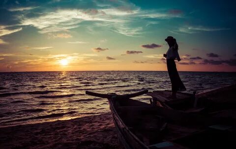 Girl On Old Boat