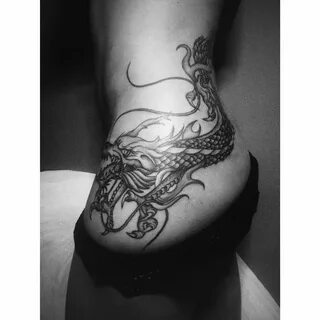 Image result for wrap dragon tattoos for women Dragon thigh 
