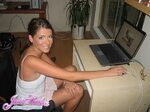 Pictures of Coed amateur Just Sasha updating her web site Co