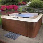This stylish acrylic hot tub is available in both Espresso a