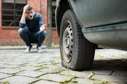 What to Do If You Get a Flat Tire - Motor Era