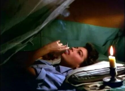 Film Noir Photos: Smoking in Bed: Ava Gardner