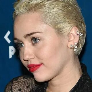 10 Best Known Miley Cyrus' Piercings Body Art Guru