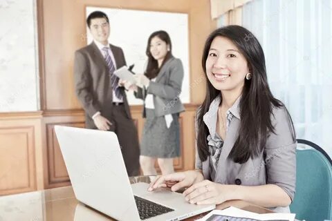 Asian businesswoman in the office Stock Photo by © OtnaYdur 
