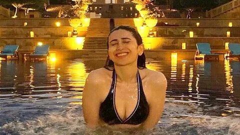 Karisma Kapoor enjoys pool time at an exotic location, share