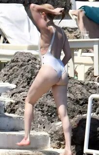 Amber Heard tits and ass in a sexy white swimsuit seen by pa