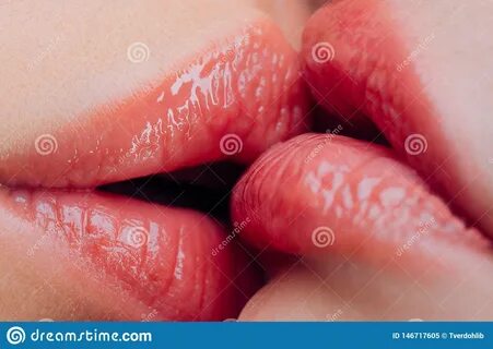 Lesbian Kiss. Sensual Wet Female Lips Kissing. Lesbian Pleas