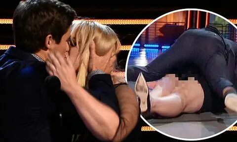 Rebel Wilson kisses Adam DeVine at MTV Movie Awards after wi