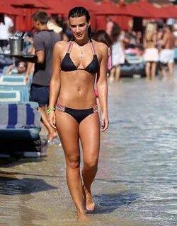 Natalie Burn showcases her toned physique in mini bikini - M