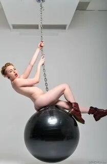 Seductive blonde doll with a cute ass Miley Mae rides a wrec