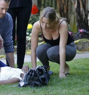 Jennifer Lawrence in Santa Monica helping a woman who fainte