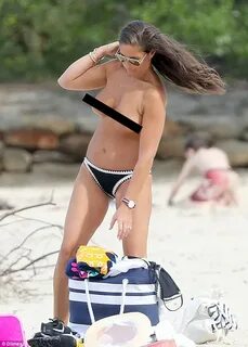 Melissa Thomas topless during visit to a Sydney beach Daily 