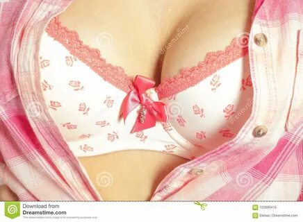 Women in pink bra tit stock image. 