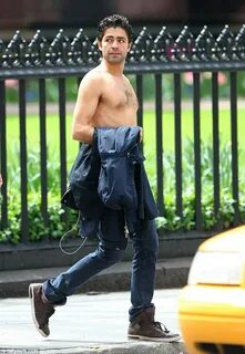 Adrian Grenier strips off in New York much to the delight of