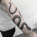 A snake that wraps a lot (actually around the whole arm). Th