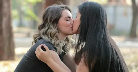 lesbian couple kissing each other outdoors: Stockvideók (100