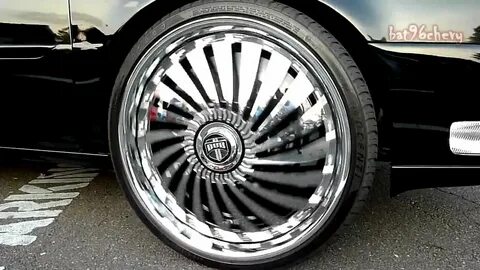 Black Cadillac Deville on 24" DUB Swyrls Floaters, w/ Floati