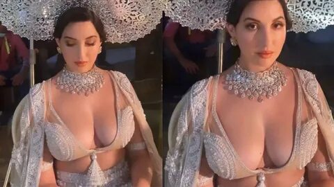 Nora Fatehi shells out queen vibes as she poses neck-deep in