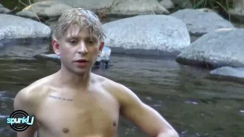 sexy blond gets naked & strokes his cock in cool deep water 