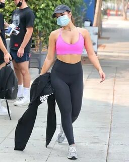 gorgeous chick Addison Rae in pink gym bra & black yogapants