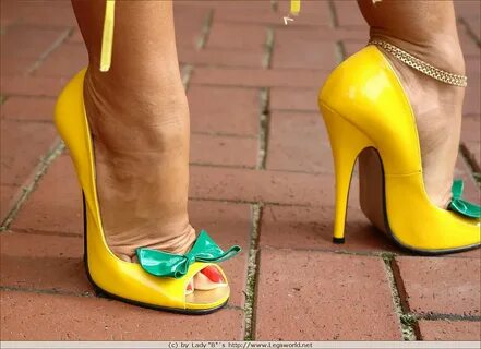 Yellow bullet high heels
