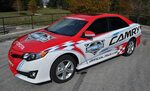 Race car wrap graphics by TechnoSigns Pace car vehicle wra. 