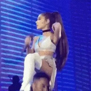 Ariana Grande flipping her trademark bj-handle