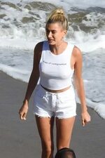 Hailey Bieber braless nipples pokies in a white top at the b