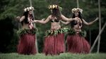 Young male and female in a group of Tahitian hula. - Royalty