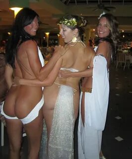 Almost nude ladies in toga revealing their naked ass in a pa