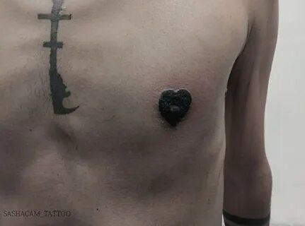 Black nipple tattoo