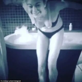 Lindsay Lohan takes ice bath in a bikini to speed up her met