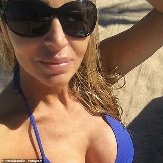 Camille Grammer, 50, flaunts her fit figure in blue bikini o