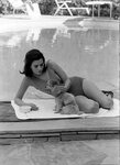 Natalie Wood poolside with doggy