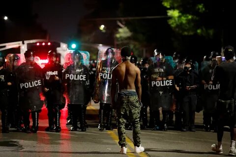 Police And Protesters Clash In St. Louis After Ex-Cop Is Acq