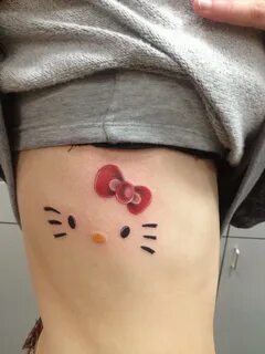 cute hello kitty tattoo (: Tatuajes de hello kitty, Tatuajes